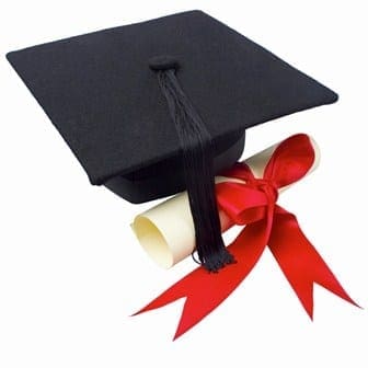 Close up of a graduation cap and a certificate with a ribbon --- Image by © Royalty-Free/Corbis graduation-cap111