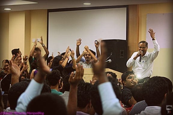TAPMI-Manipal-2012-Fresher-Induction-Day-Prof.-Chowdari-P-Crooning-on-Stage-and-Crowd-Goes-Crazy