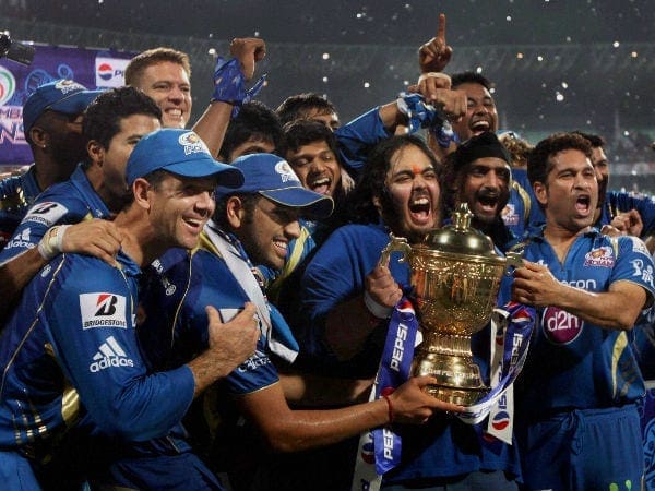 Mumbai Indians team with the IPL Trophy for 2013.