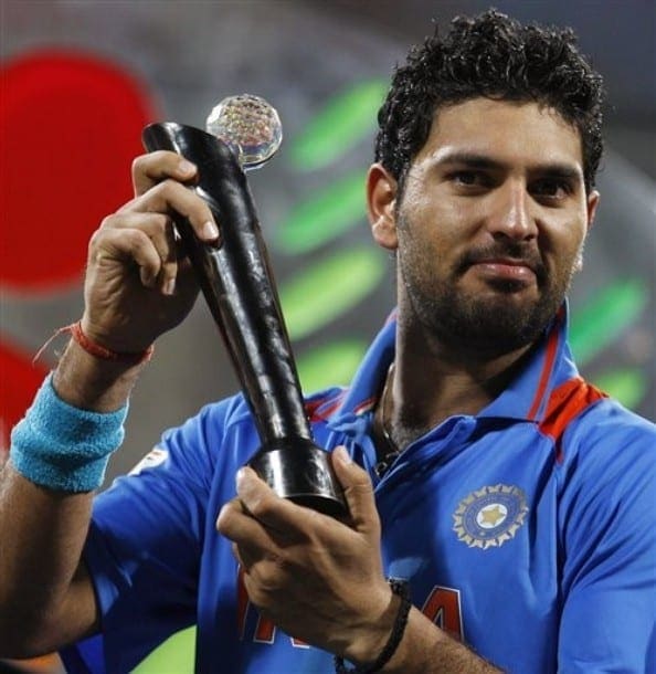 Yuvraj Singh with the ICC World Cup 2011 Player of the Series Trophy 1062583 2