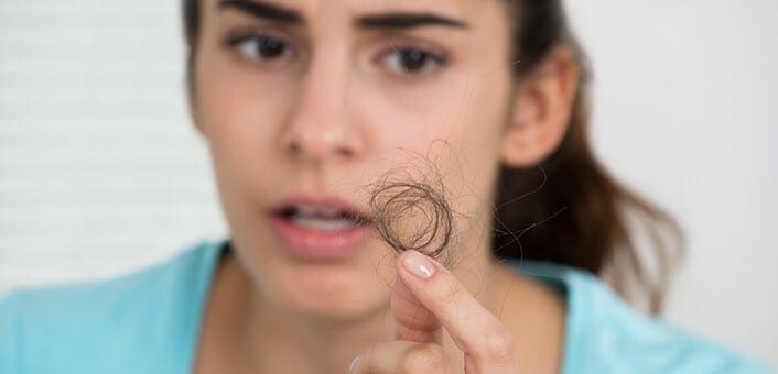 Teen with hair fall