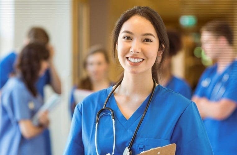 Lady in doctor scrubs with stethescope