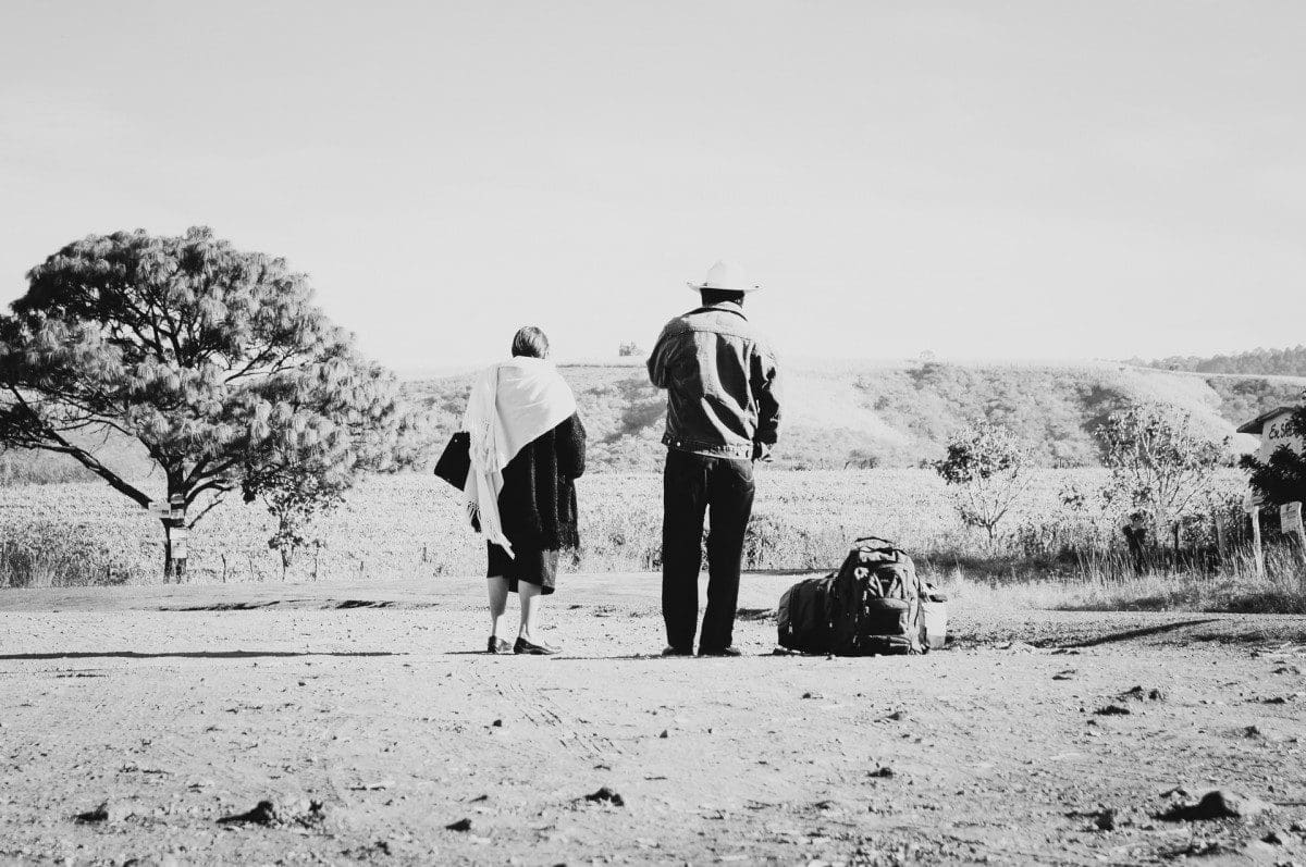 elderly woman traveling with son