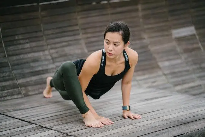 Woman Excercising On Floor