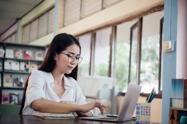 Lady Working On Computer