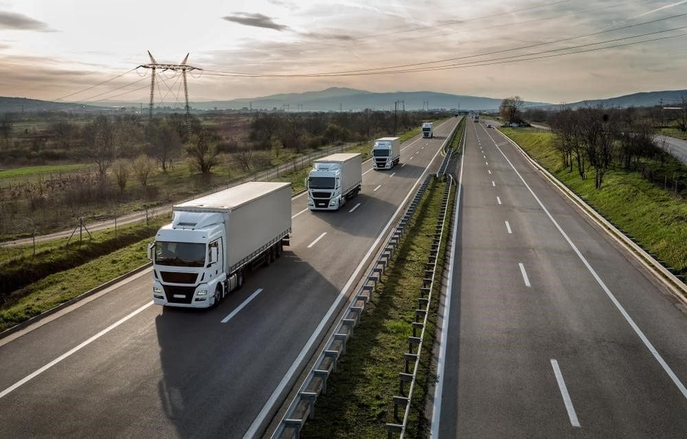 Fleet Of Trucks On Highway