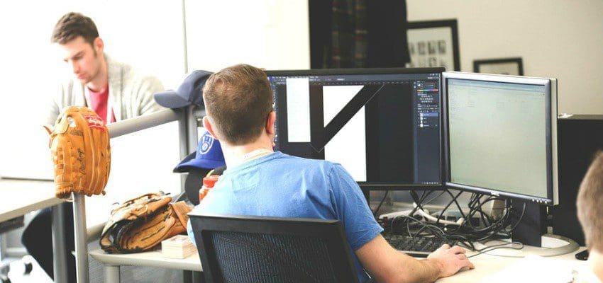 software Men Working On Computers