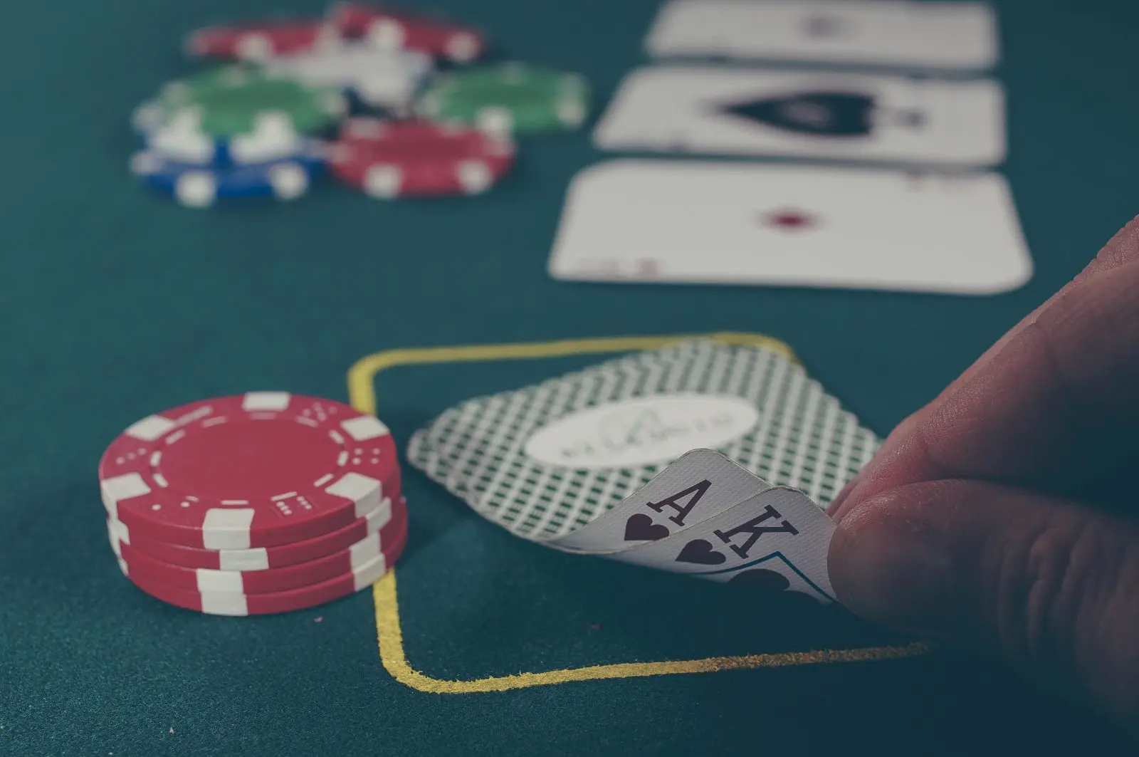 Photo by Michał Parzuchowski poker games card games