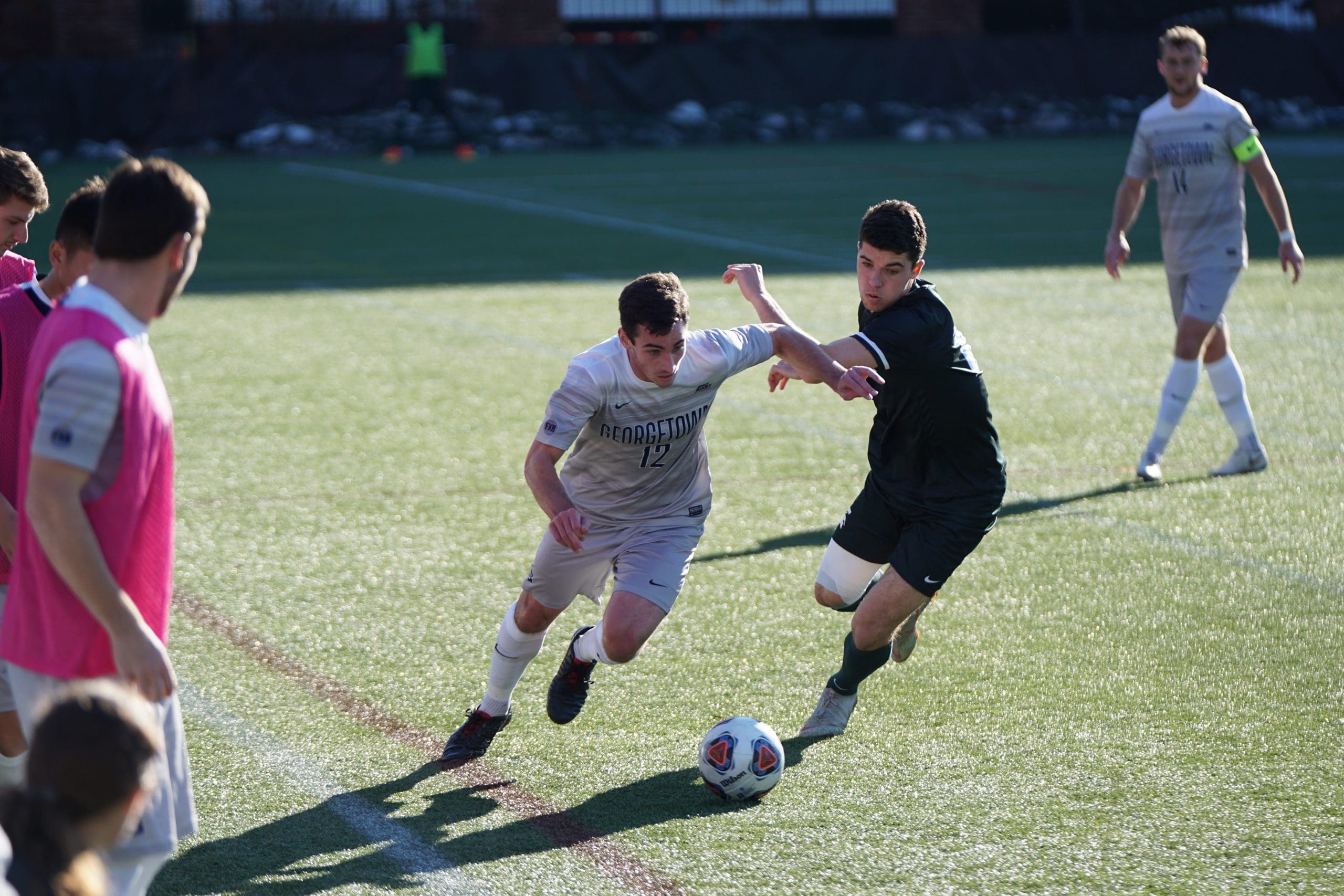 man playing soccer on the field soccer drills go a long way in match situations