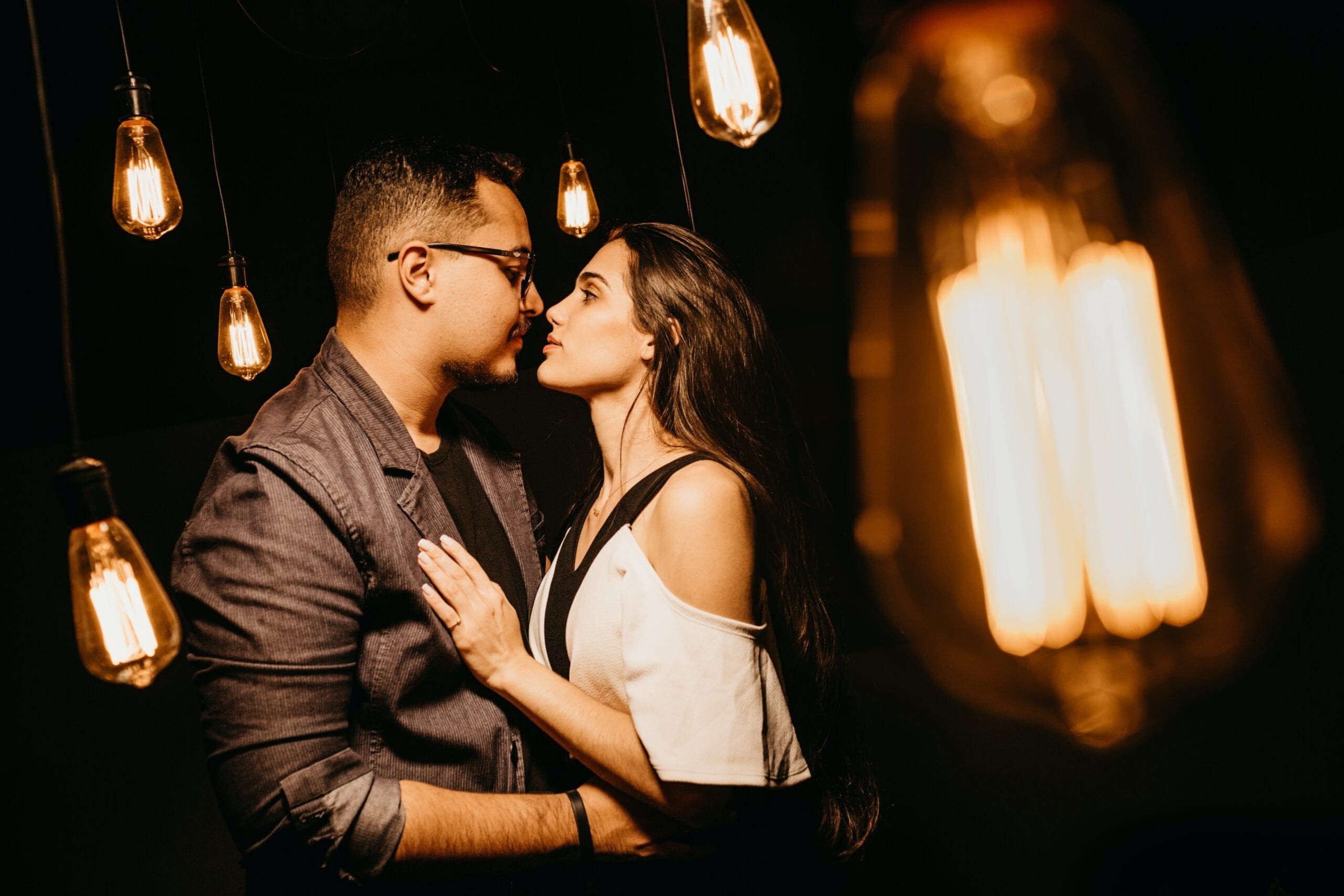 man wearing gray suit jacket and woman wearing white blouse introverts