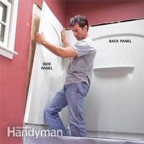 Install the acrylic tub surround
