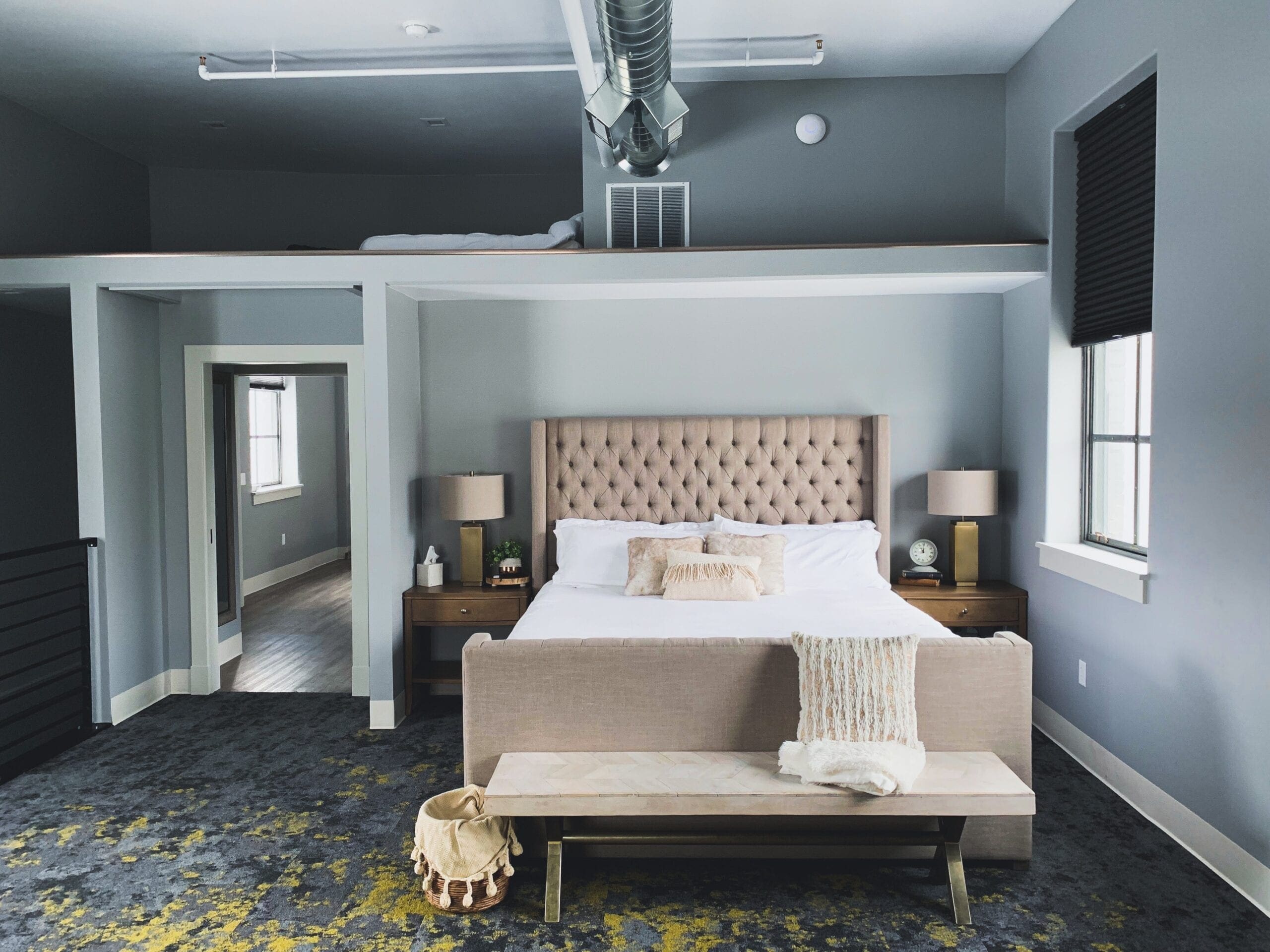 beige bed with mattress small bedroom