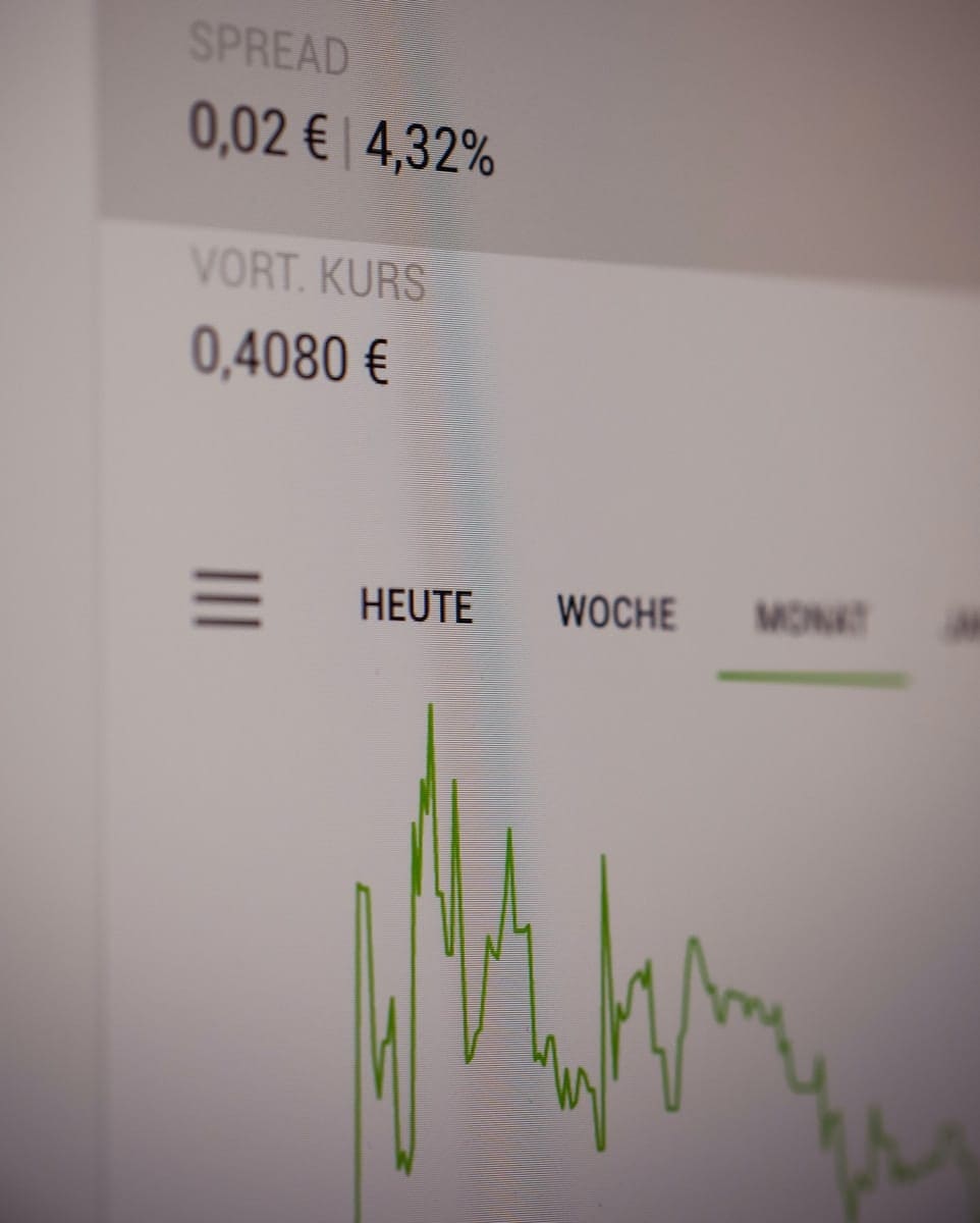 white printer paper with green line currency trader