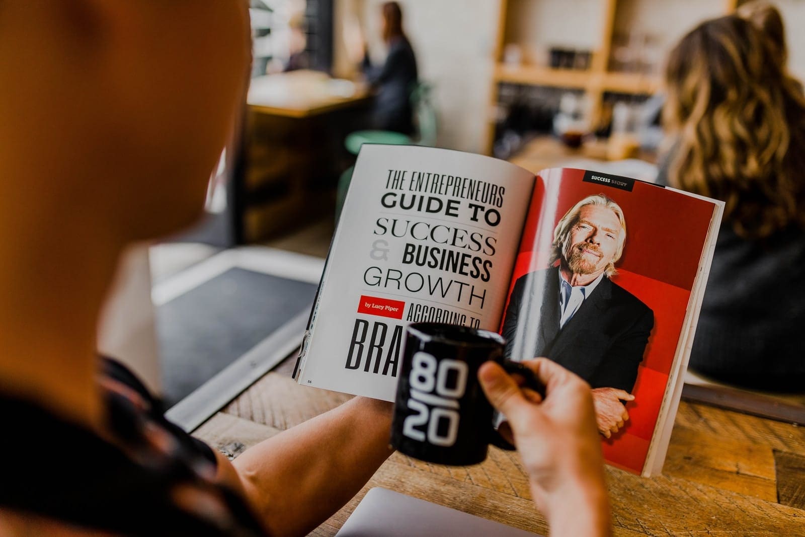 man reading magazine affiliate marketing