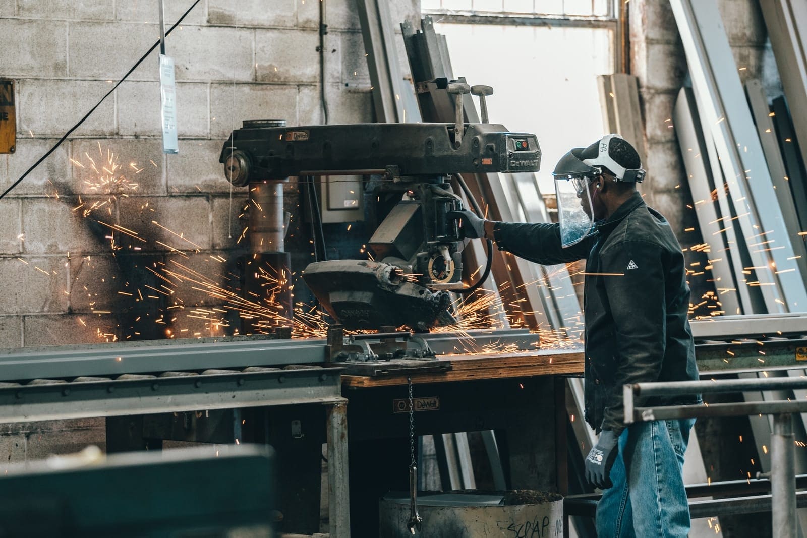 man working on tools welding machines