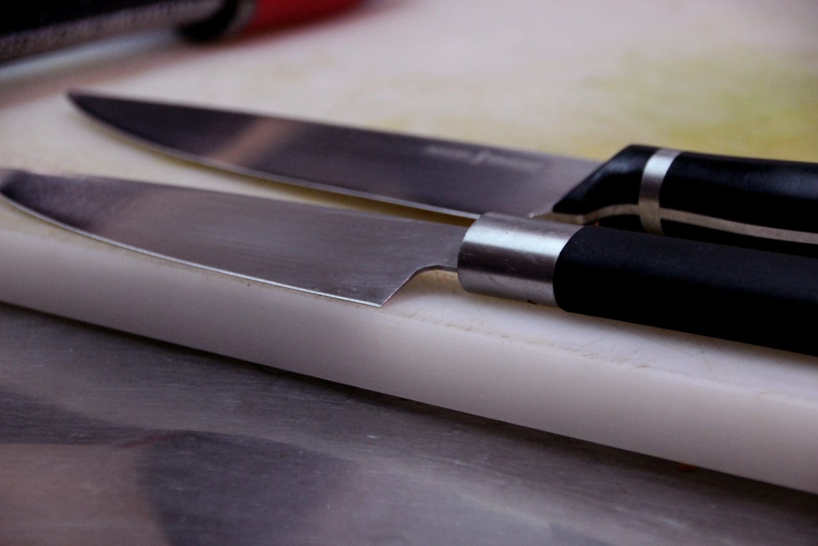 kitchen knives on cutting board