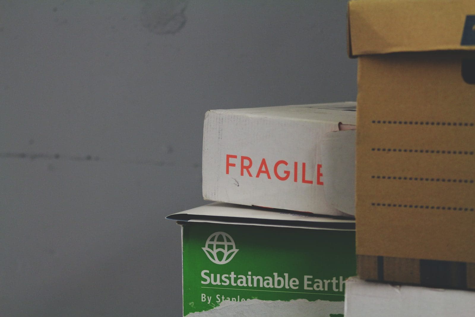moving company white and red Fragile labeled box