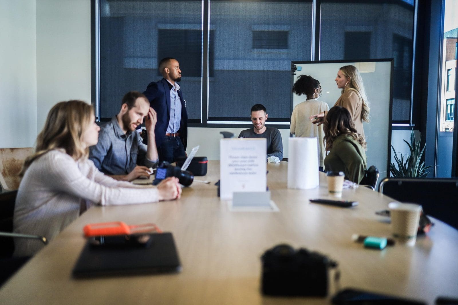 flip charts people sitting at the table