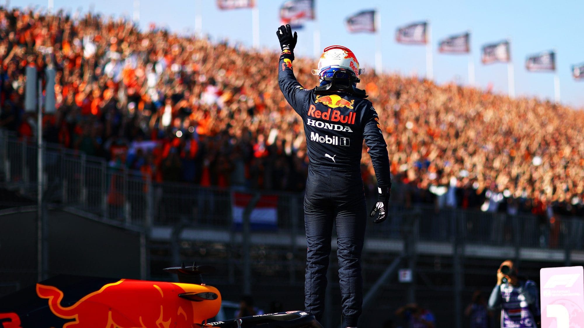 MAx Verstappen celewbrates pole at 2021 Dutch GP with orange army