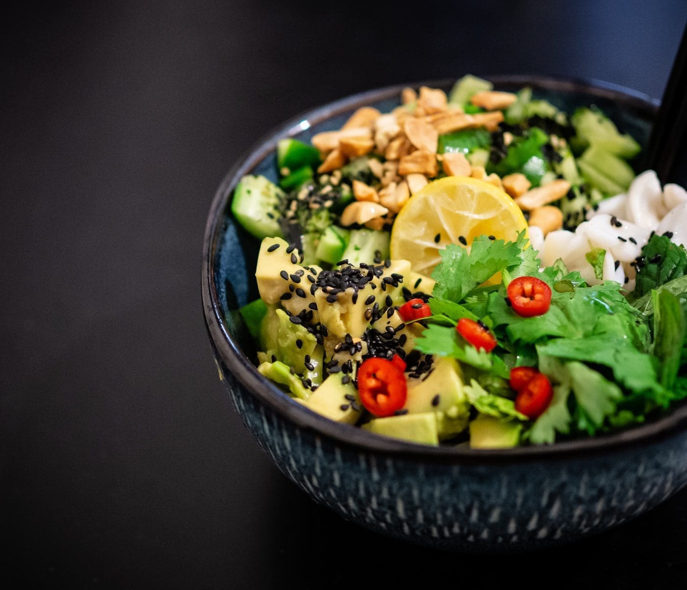 Vegan diet keto vegetable salad in gray bowl