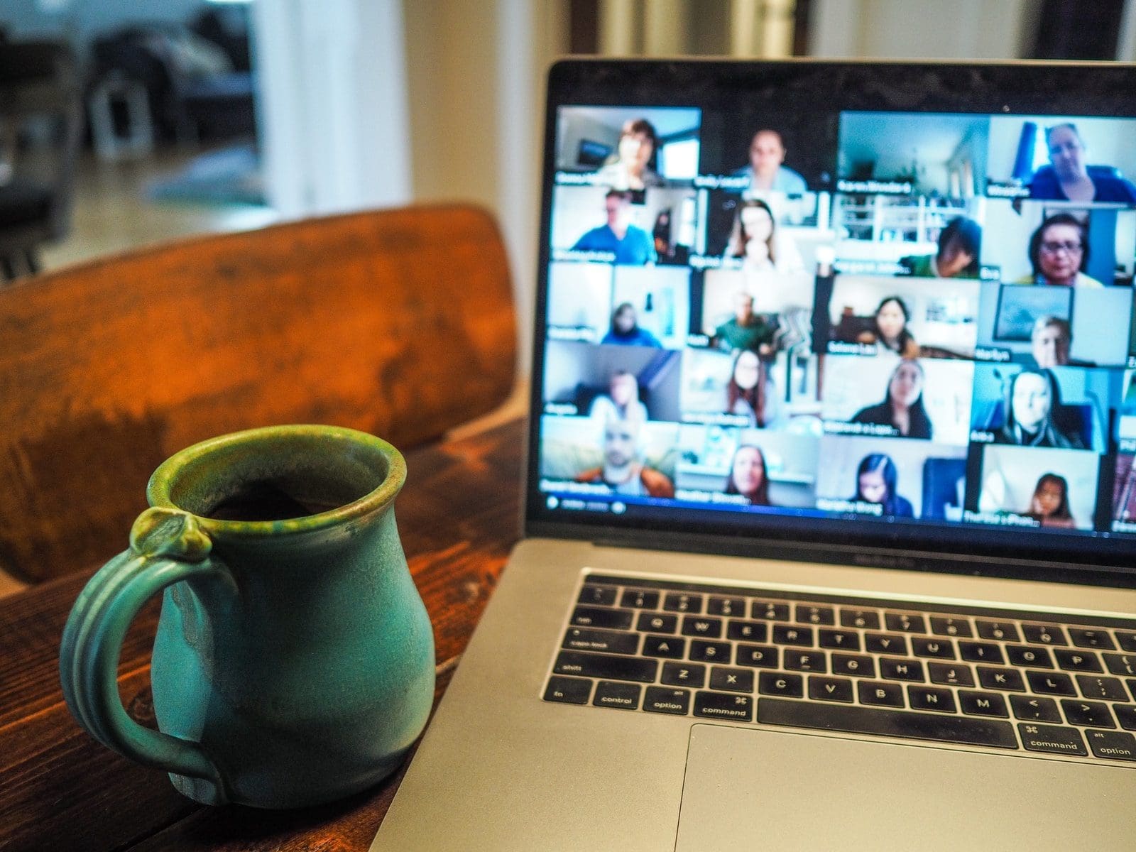 Teacher teaching online to group of people