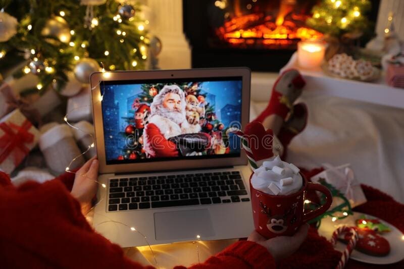 mykolaiv ukraine december woman sweet drink watching christmas chronicles movie laptop near fireplace mykolaiv 208410575