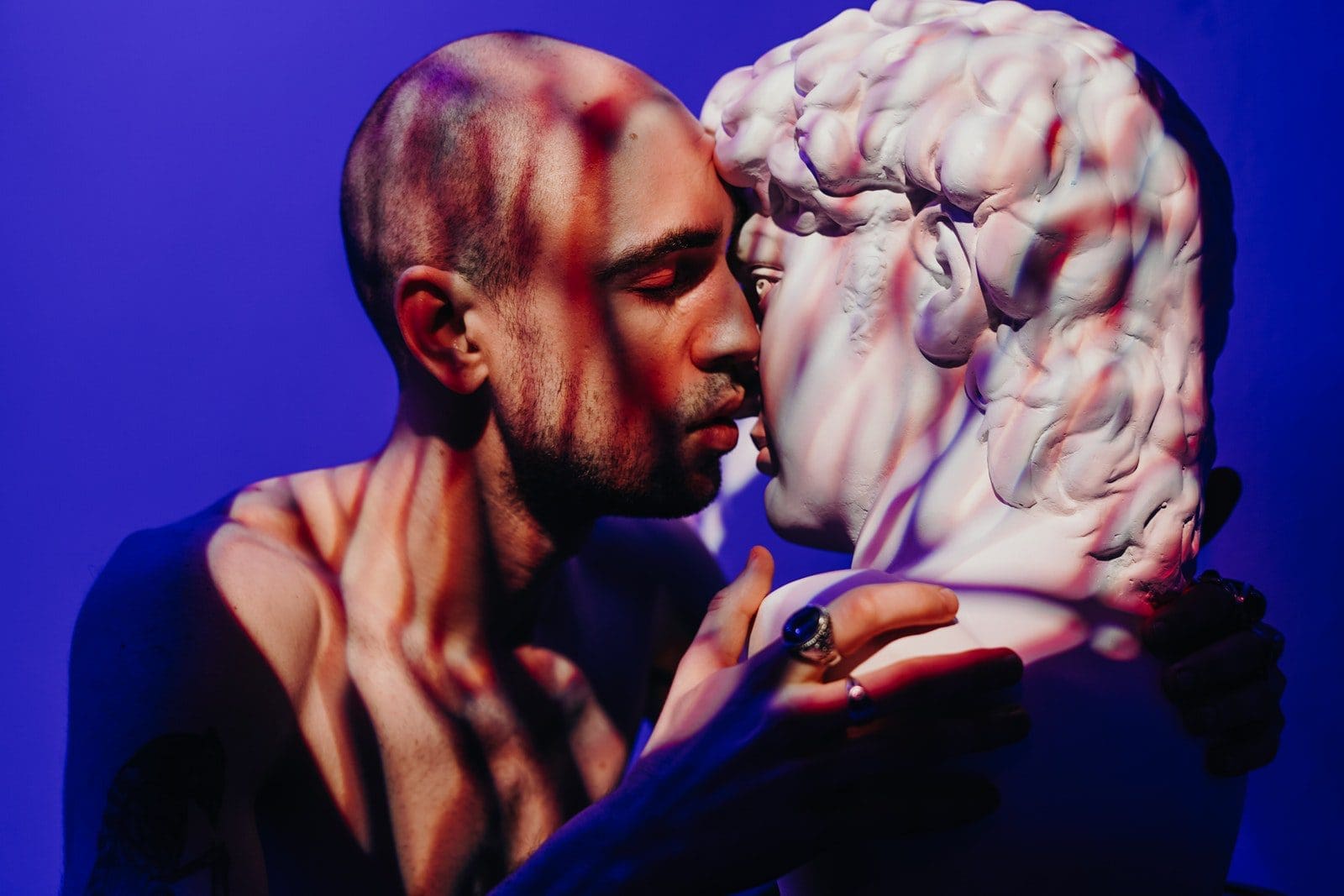 impulse control disorder Man Kissing a Gypsum Head