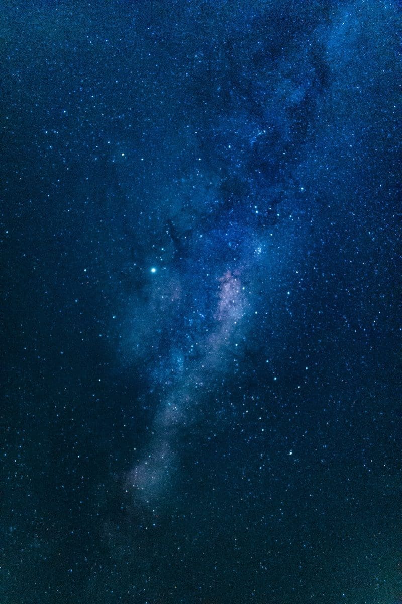 Photo by Nicole Avagliano blue and black galaxy illustration