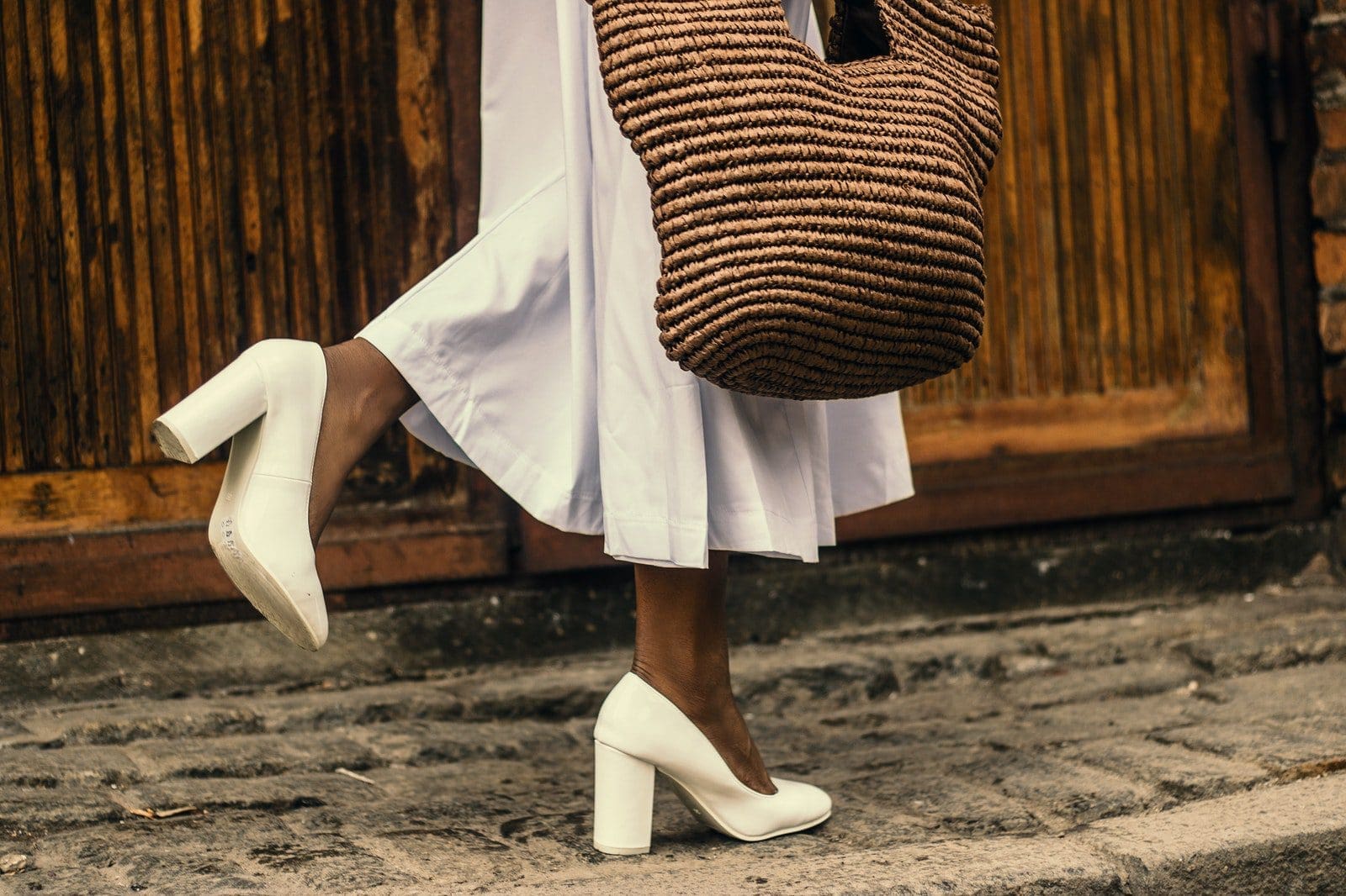 shoes for women Woman Wearing White Dress and White High-heeled Shoes While Walking on Sidewalk
