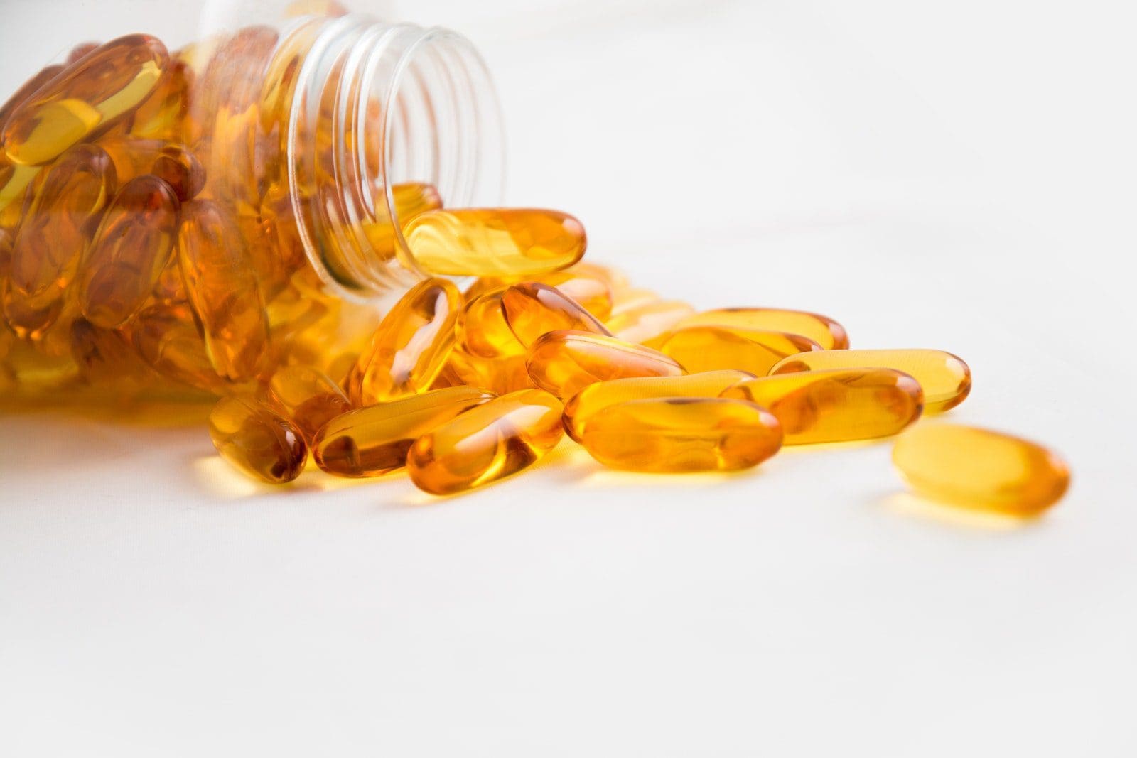 Photo by Pixabay pre-workout supplements Spilled Bottle of Yellow Capsule Pills