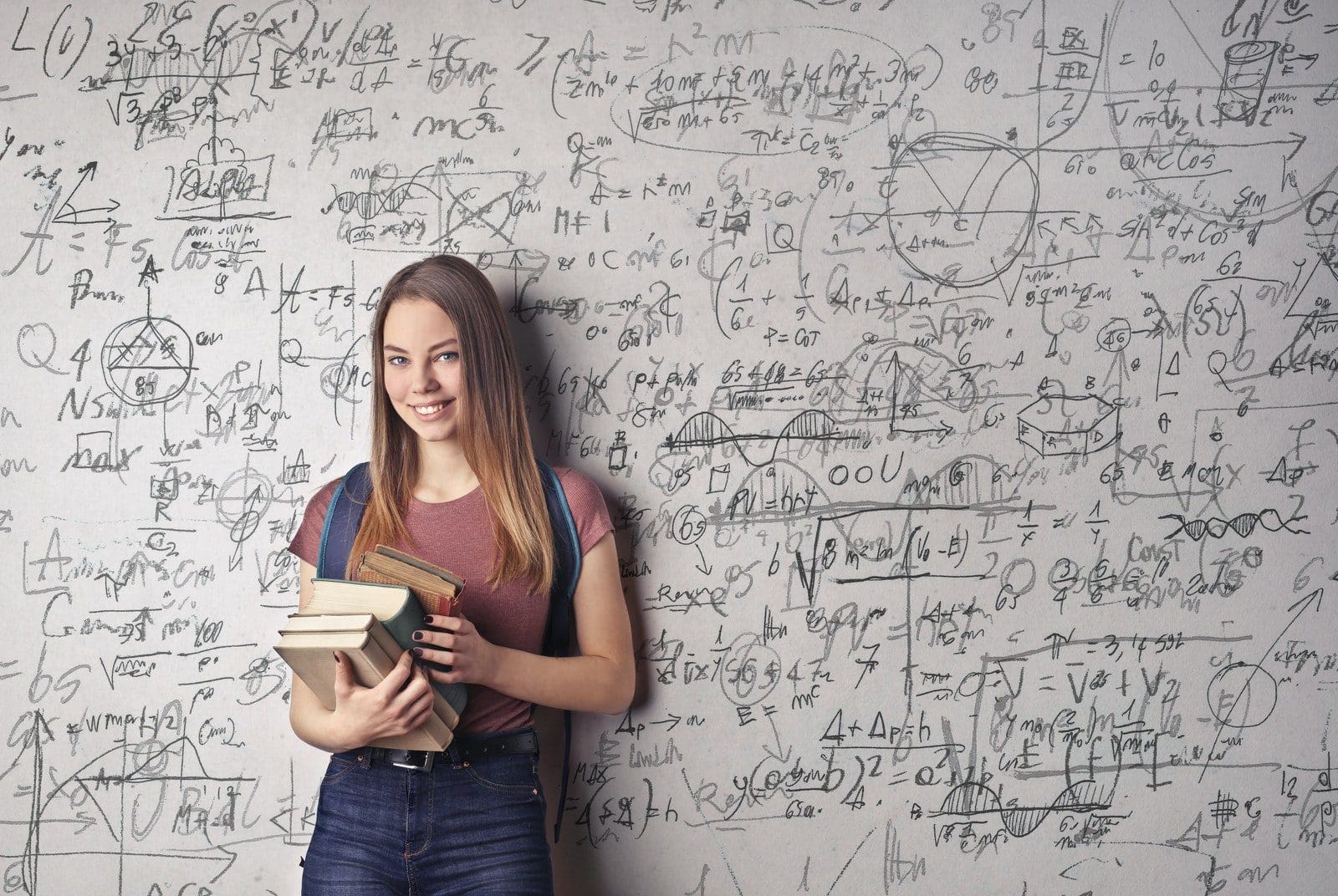 Woman Holding Books mathematician