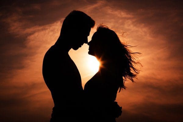 depositphotos 41066325 stock photo couple in love silhouette during