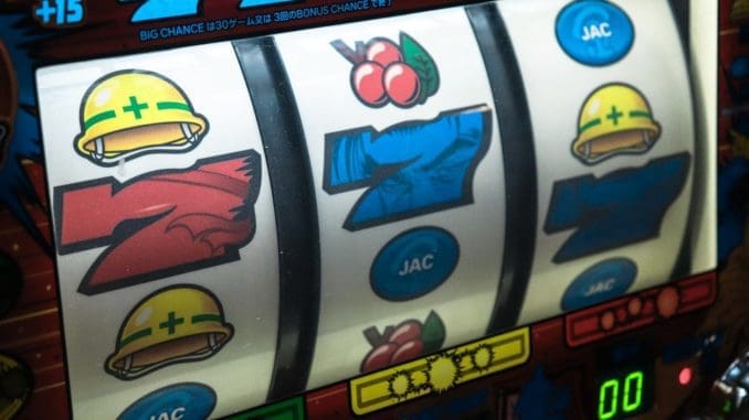 online slot machine displaying three seven