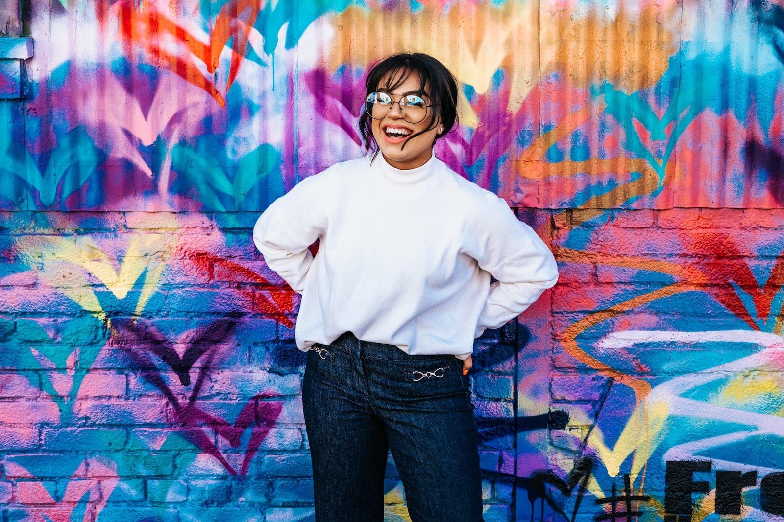 Street Style Fashion: How To Create Your Own Unique Look 1 woman standing in front of multicolored wall