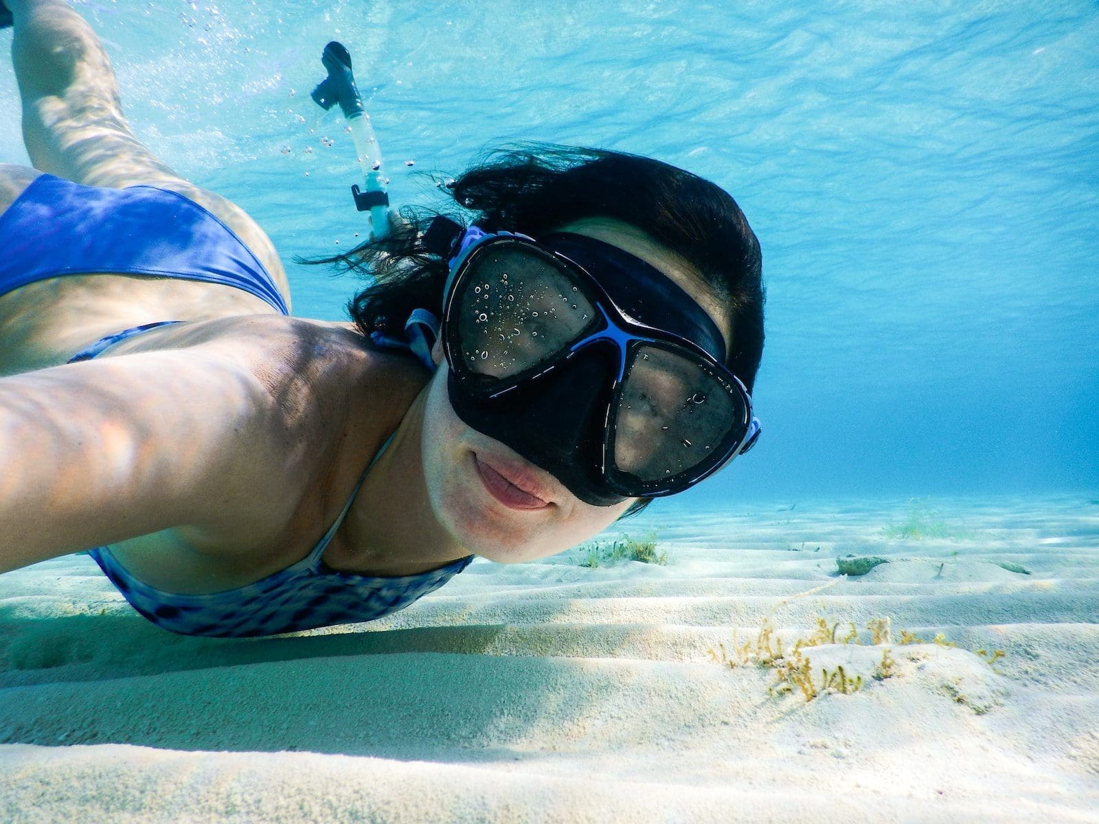 A Travel Guide To Andaman And Nicobar Islands 1 woman in blue swimming goggles and swimming goggles in water