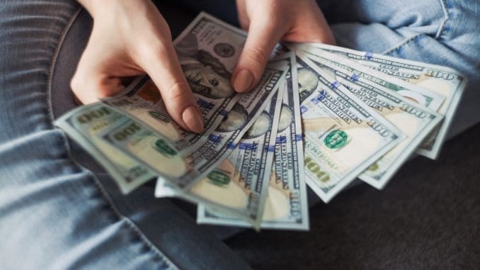 Tips For Budgeting Well As A First Year In Manipal 1 fan of 100 U.S. dollar banknotes