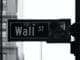grayscale photo of Wall St. signage stock investment