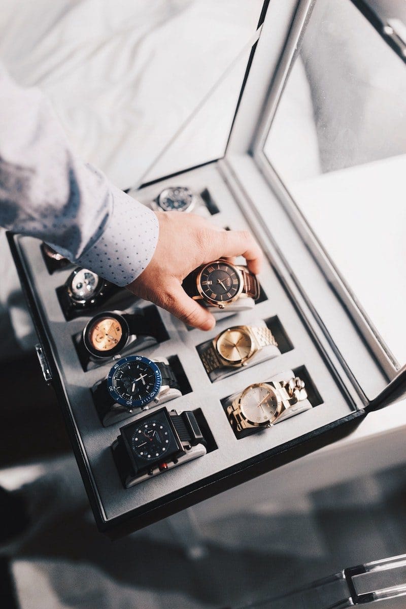 Where To Buy Rolex Watches? 1 Person Holding Round Gold-colored Analog Watch With Link Bracelet