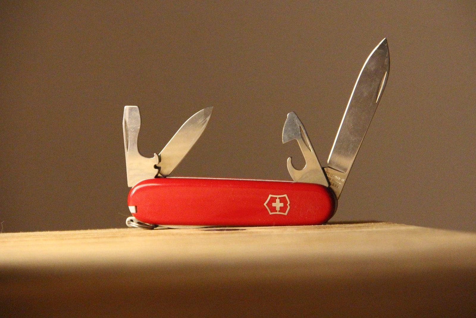 red and silver multi tool safety equipment