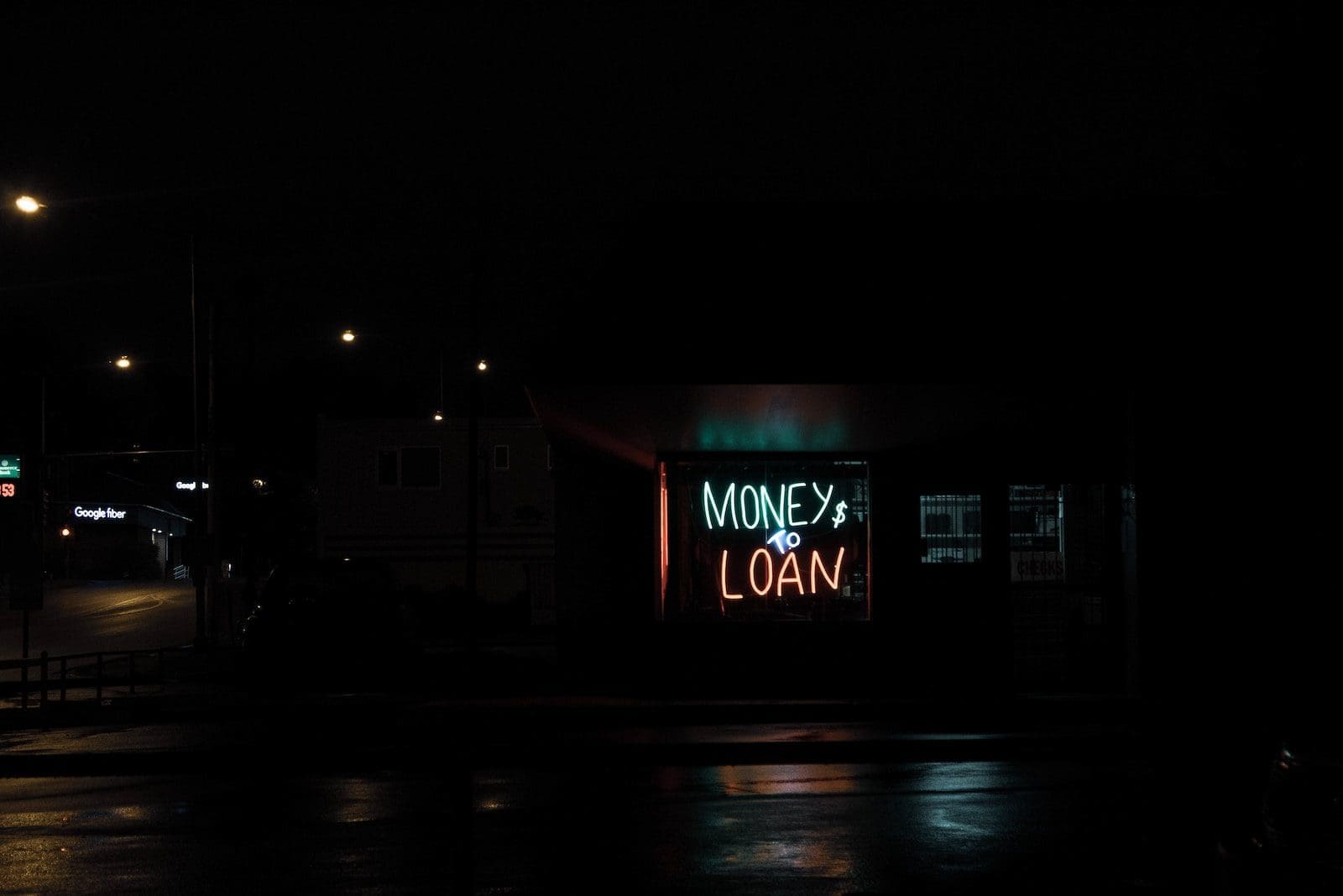 Salary Advance Loan: Definition, Uses &Amp; Incredible Benefits 1 a neon sign is lit up in the dark