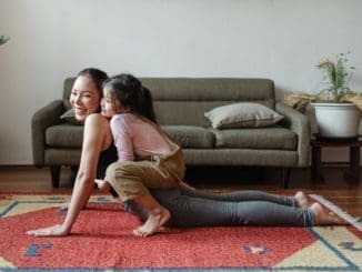 Photo of Girl Hugging Her Mom While Doing Yoga Pose your training