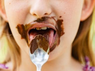 Woman With Brown and White Cream on Her Mouth chocolate meditation