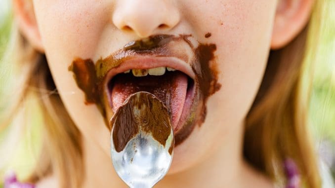 Woman With Brown and White Cream on Her Mouth chocolate meditation