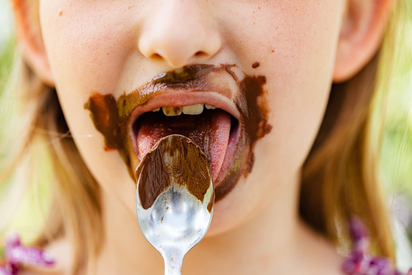 Woman With Brown and White Cream on Her Mouth chocolate meditation