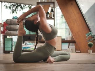 woman doing yoga teacher training