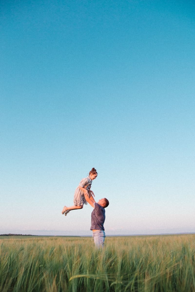 My First Love 1 man in blue denim jeans jumping on beach during daytime
