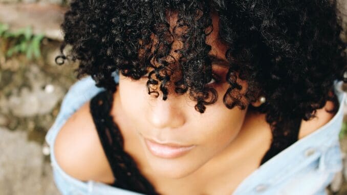 How To Make Everyday A Good Hair Day 1 woman with curly hair good hair day