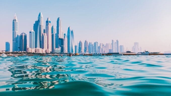 city skyline under blue sky during daytime Beachfront Luxury