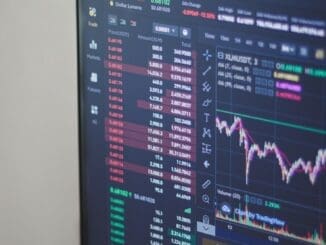 black flat screen computer monitor spread your stocks